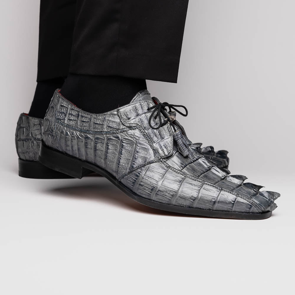 The Marco Di Milano Cancun Gray is a luxury men's derby shoe made from genuine hornback caiman crocodile leather in gray, with black laces, red lining, and brown leather soles—an exquisite choice in exotic footwear.