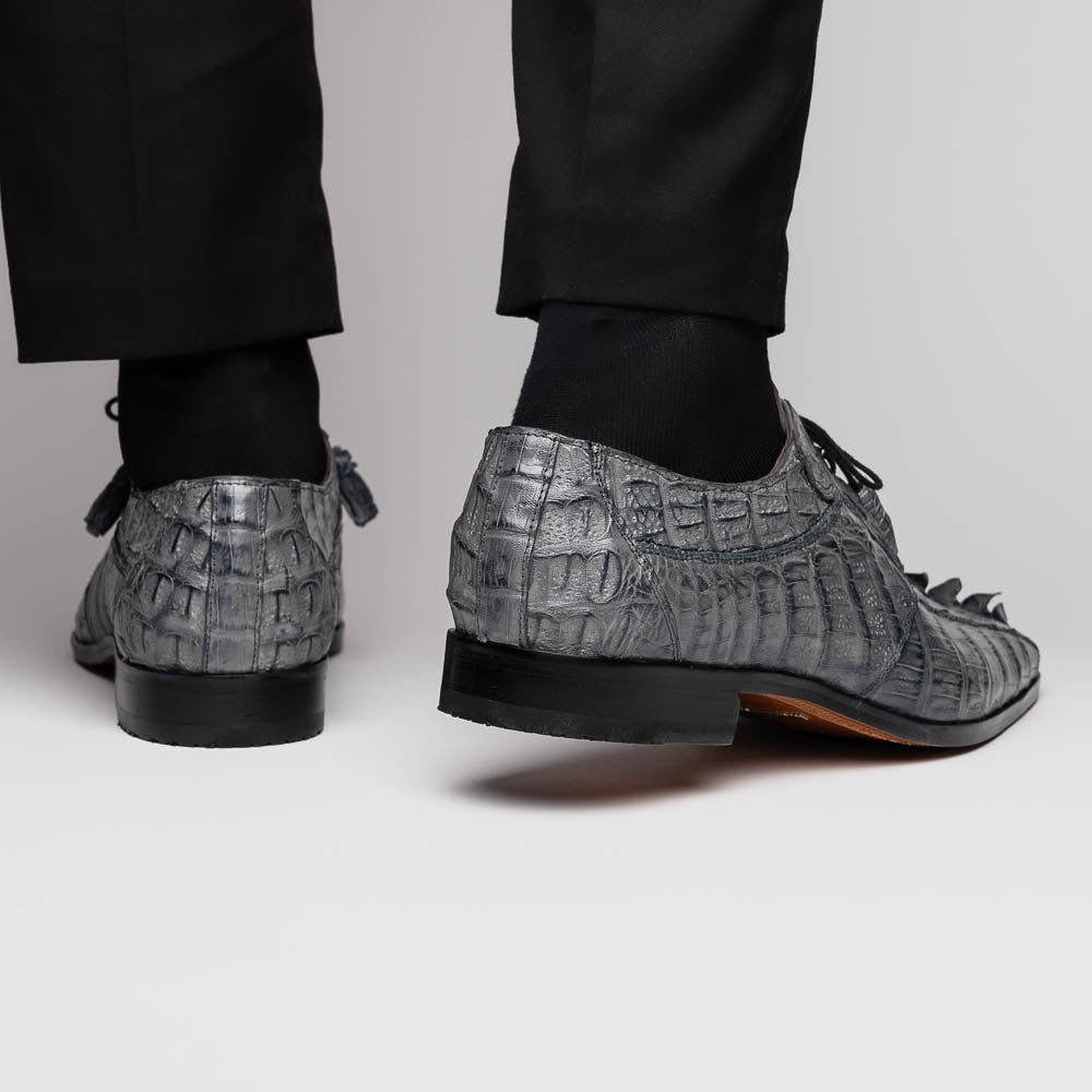 The Marco Di Milano Cancun Gray is a luxury men's derby shoe made from genuine hornback caiman crocodile leather in gray, with black laces, red lining, and brown leather soles—an exquisite choice in exotic footwear.