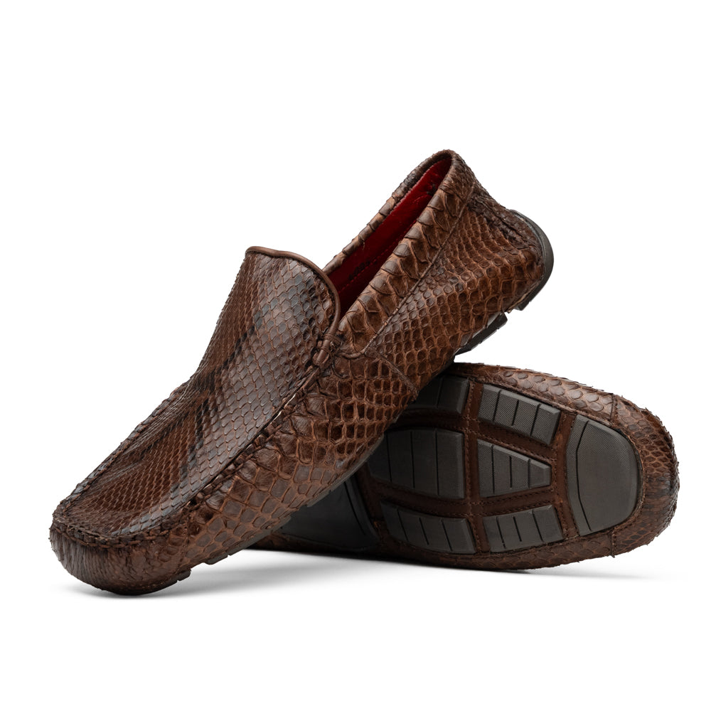 A pair of Capri Brown luxury exotic shoes by Marco Di Milano, crafted from genuine python leather, with one handcrafted men’s loafer standing upright and the other displayed on its side to highlight the intricately textured sole.
