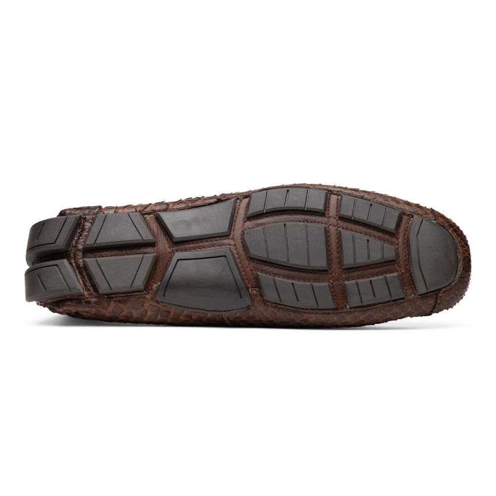 A pair of Capri Brown luxury exotic shoes by Marco Di Milano, crafted from genuine python leather, with one handcrafted men’s loafer standing upright and the other displayed on its side to highlight the intricately textured sole.