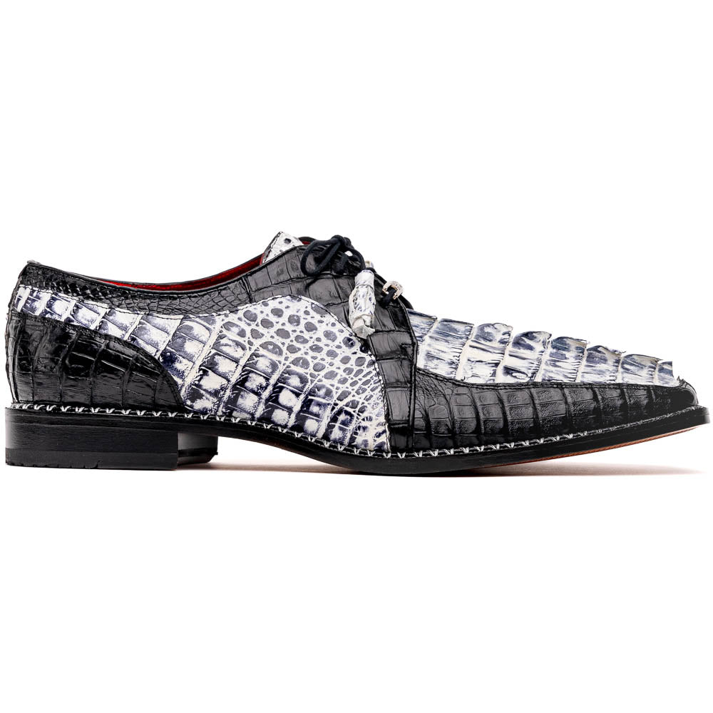 A pair of Marco Di Milano Caribe Newspaper / Black luxury dress shoes crafted from genuine hornback caiman crocodile leather, with one upright and the other on its side showing the brown sole and exquisite hand-painted details.