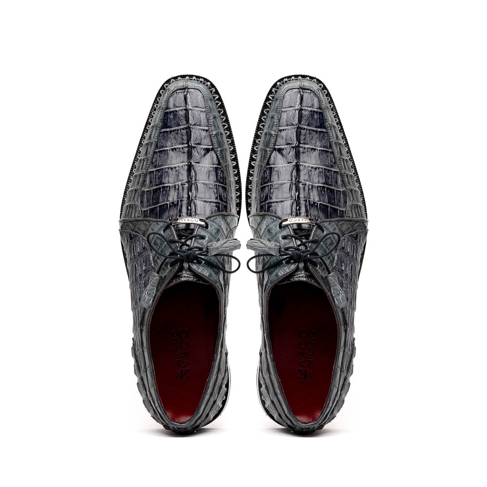 The Caribe Dark Gray by Marco Di Milano is a pair of luxury derby shoes crafted from genuine hornback caiman crocodile, with black laces and a brown leather sole—a standout in exotic footwear.