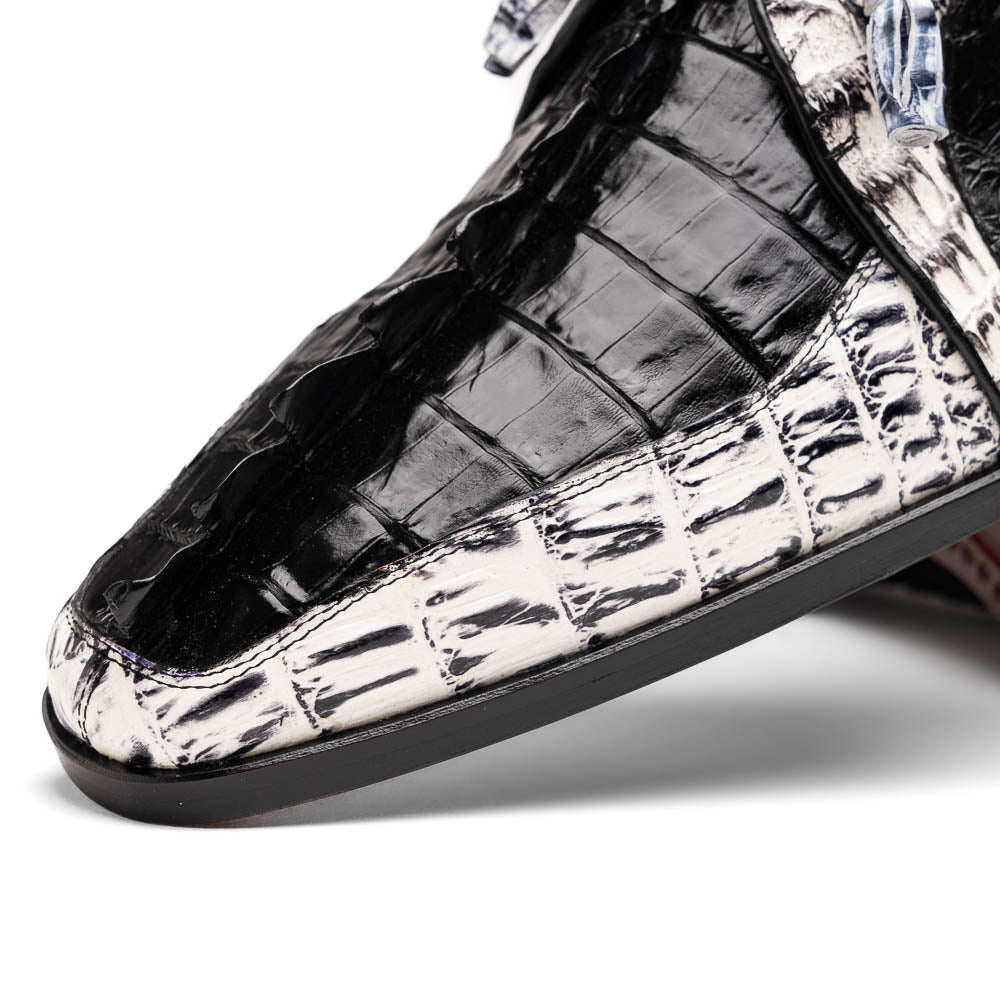 The Marco Di Milano Caribe Black / Newspaper are luxury men's derby shoes crafted from genuine hornback caiman crocodile leather in black and white, featuring red lining, leather soles, lace-up closures, and decorative tassels.