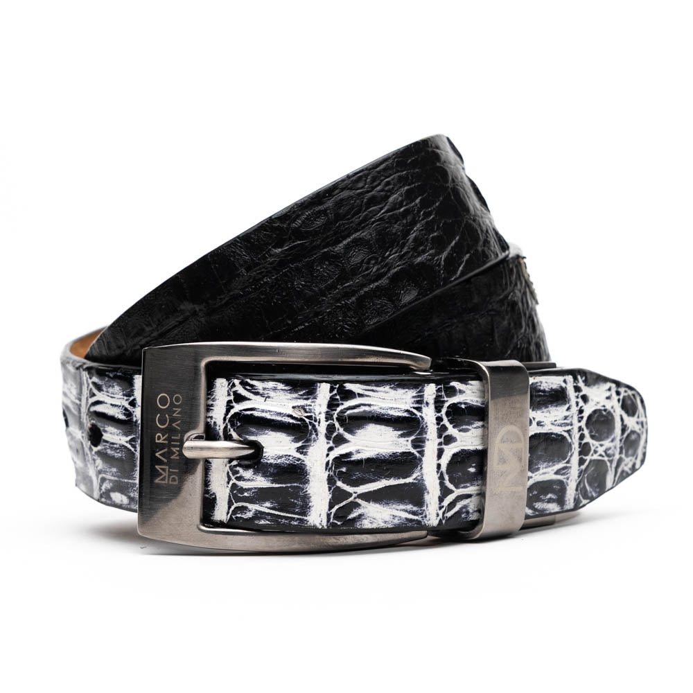 The Caribe Belt Newspaper / Black by Marco Di Milano features rolled black leather, a newspaper-textured white and black tip, and a silver engraved buckle—an elegant statement of luxury exotic belts.