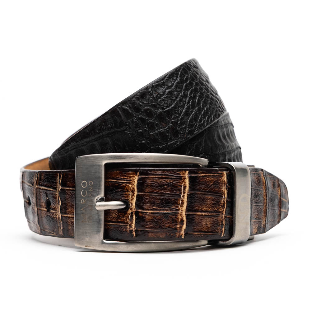 The Marco Di Milano Caribe Belt Brown / Pantano, a luxurious men's belt crafted from exotic caiman fuscus leather in brown and black with a silver buckle, is coiled against a white background.