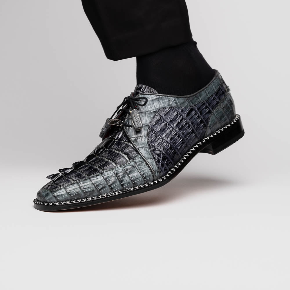 The Caribe Dark Gray by Marco Di Milano is a pair of luxury derby shoes crafted from genuine hornback caiman crocodile, with black laces and a brown leather sole—a standout in exotic footwear.