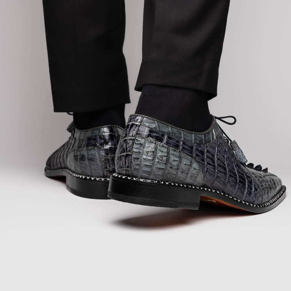 The Caribe Dark Gray by Marco Di Milano is a pair of luxury derby shoes crafted from genuine hornback caiman crocodile, with black laces and a brown leather sole—a standout in exotic footwear.