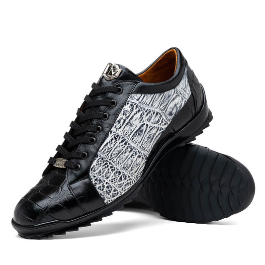 The Marco Di Milano Cairo Black/White sneakers feature a black and white low-top design, crocodile texture details, black laces, and thick black rubber soles—ideal for those seeking luxury footwear with a unique edge.