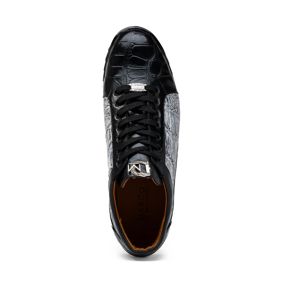 The Marco Di Milano Cairo Black/White sneakers feature a black and white low-top design, crocodile texture details, black laces, and thick black rubber soles—ideal for those seeking luxury footwear with a unique edge.