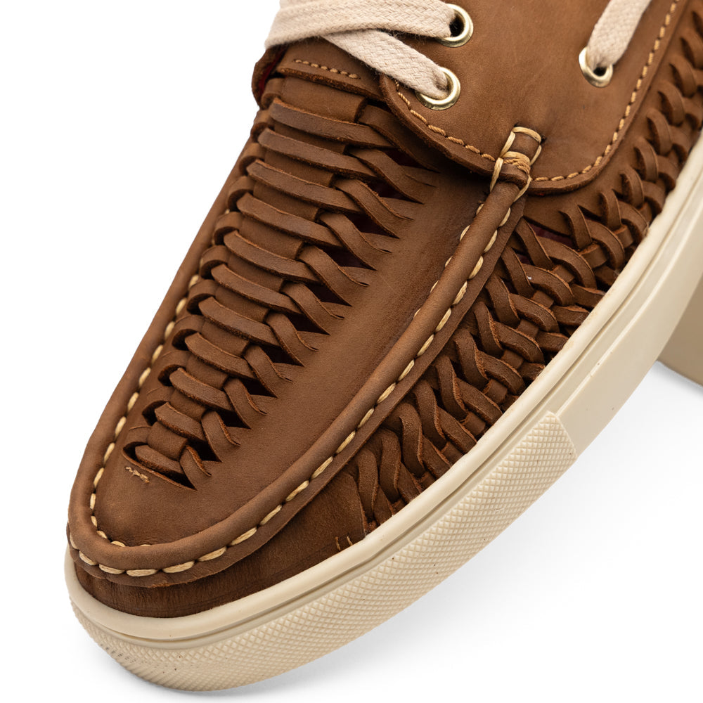 Castell Bronze boat shoe by Marco Di Milano in brown premium calf leather with a woven side panel, cream-colored laces, and a matching sole.