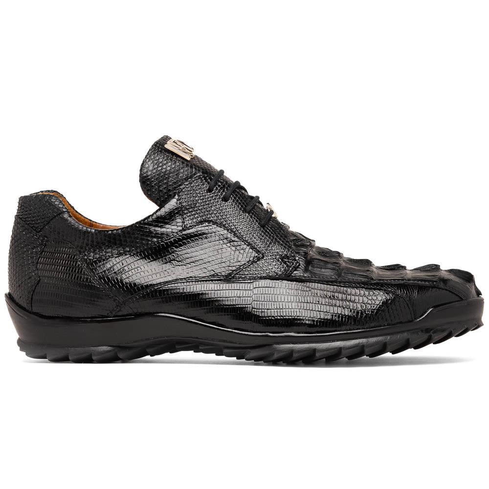 The Crater Black by Marco Di Milano features black textured leather with a crocodile pattern and metallic logo accents, exemplifying genuine exotic shoe craftsmanship—one shoe stands upright, the other lies on its side.