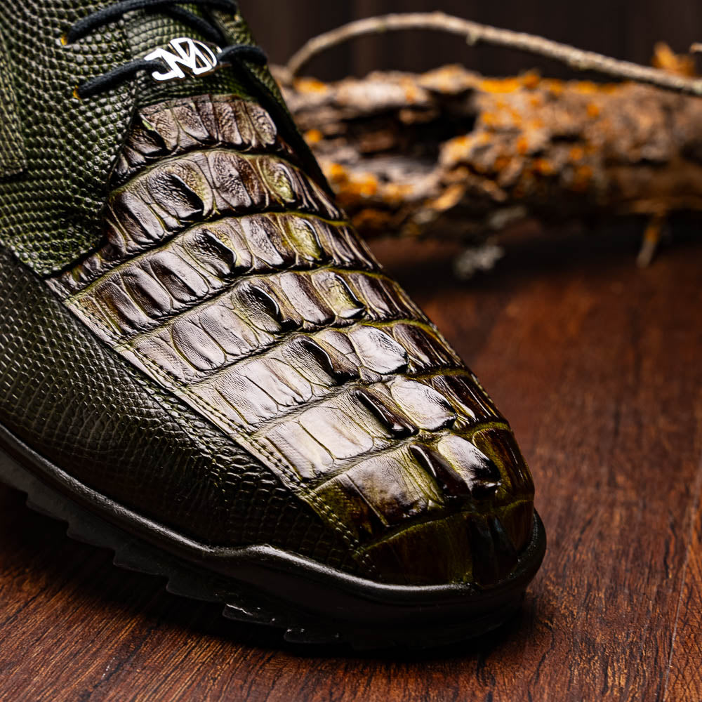 The Marco Di Milano Crater Rustic Olive sneakers boast green textured leather with a crocodile pattern, black soles and laces, hand-painted finishes, and metallic "ND" logos—ideal for true luxury footwear enthusiasts.