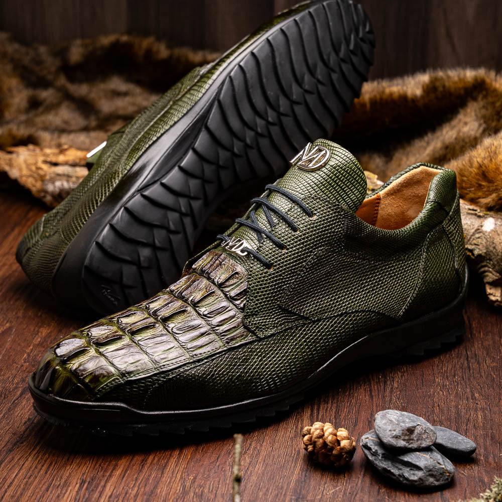 The Marco Di Milano Crater Rustic Olive sneakers boast green textured leather with a crocodile pattern, black soles and laces, hand-painted finishes, and metallic "ND" logos—ideal for true luxury footwear enthusiasts.