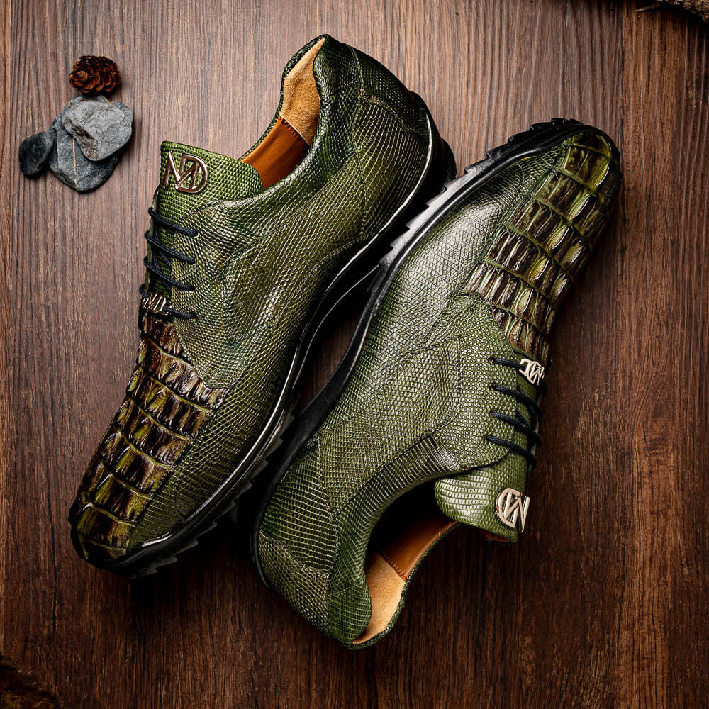 The Marco Di Milano Crater Rustic Olive sneakers boast green textured leather with a crocodile pattern, black soles and laces, hand-painted finishes, and metallic "ND" logos—ideal for true luxury footwear enthusiasts.