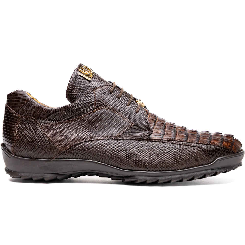 The Crater Brown by Marco Di Milano features brown textured leather with crocodile pattern accents, gold "MD" logos, and black rubber soles, blending dress shoe elegance with caiman hornback sneaker style.