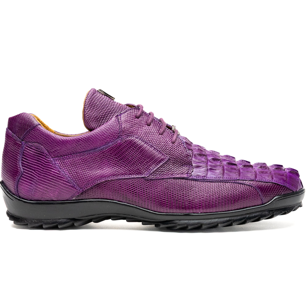 The Marco Di Milano Crater Purple sneakers showcase bold, textured elegance with their purple lizard skin and black rubber soles—luxury men’s footwear where one sneaker stands upright and the other leans.