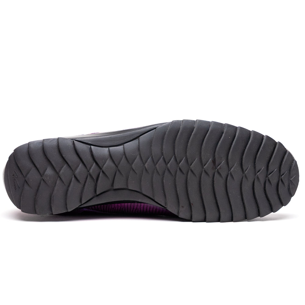 The Marco Di Milano Crater Purple sneakers showcase bold, textured elegance with their purple lizard skin and black rubber soles—luxury men’s footwear where one sneaker stands upright and the other leans.