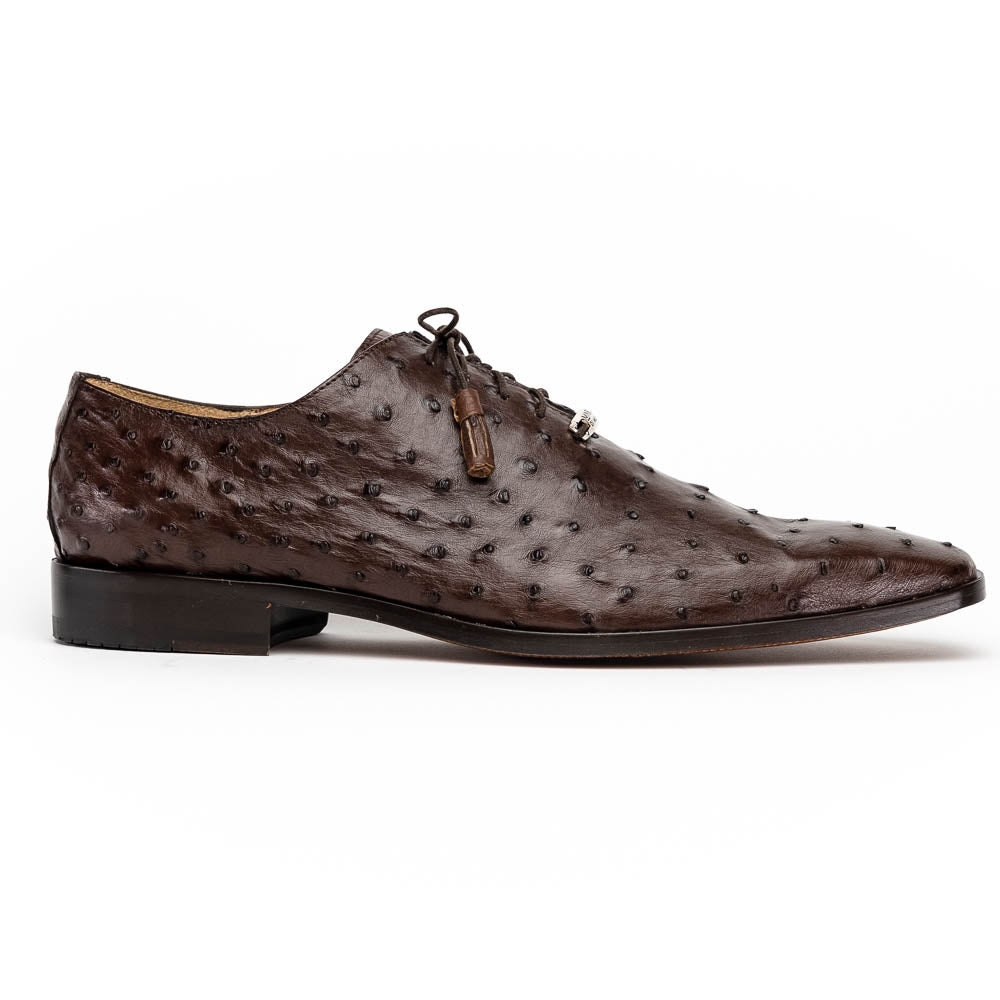 The Criss Brown by Marco Di Milano is a pair of luxury dress oxfords in dark brown genuine ostrich quill leather with decorative laces and a leather sole, shown with one shoe elegantly displayed on its side atop the other.