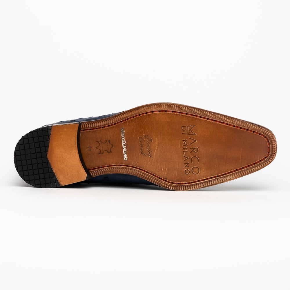The Criss Navy by Marco Di Milano: a pair of genuine ostrich dress shoes with blue leather, black laces, red inner lining, and brown soles—one upright, one on its side—showcasing luxury men’s footwear.