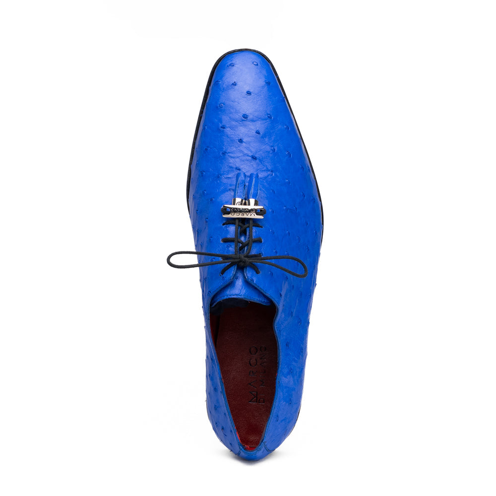Introducing the Criss Electric Blue by Marco Di Milano—a pair of vibrant blue genuine ostrich quill leather oxford dress shoes featuring stylish laces and sleek metal detailing. One shoe stands upright while the other displays its beautifully crafted sole, making them an exceptional choice for anyone looking for distinctive luxury footwear.