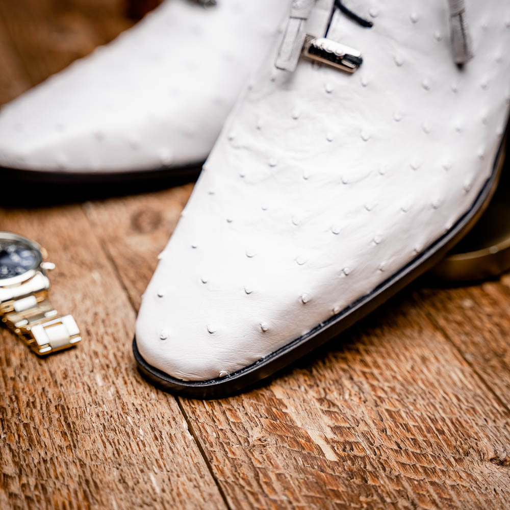 The Criss White by Marco Di Milano is a genuine ostrich quill luxury dress oxford featuring black laces, red inner lining, and a tan leather sole, shown on a white background.