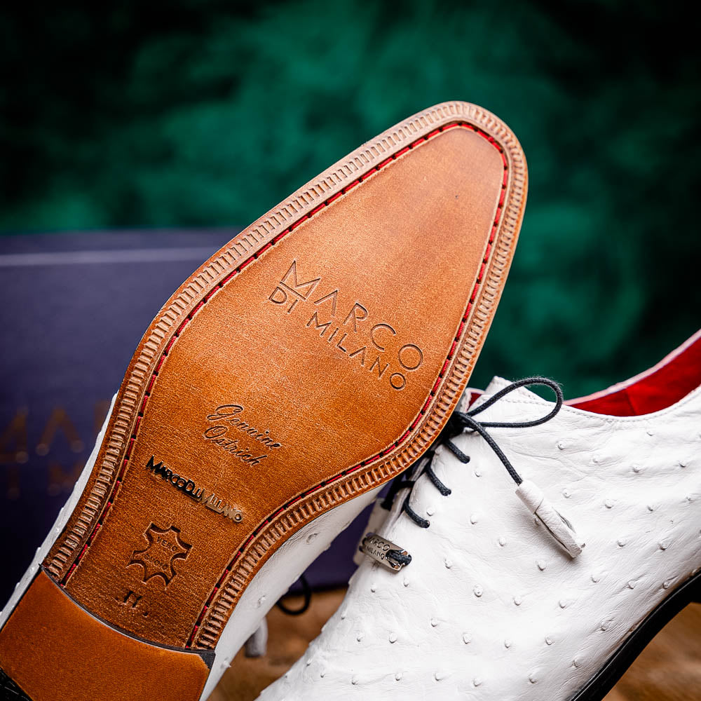 The Criss White by Marco Di Milano is a genuine ostrich quill luxury dress oxford featuring black laces, red inner lining, and a tan leather sole, shown on a white background.