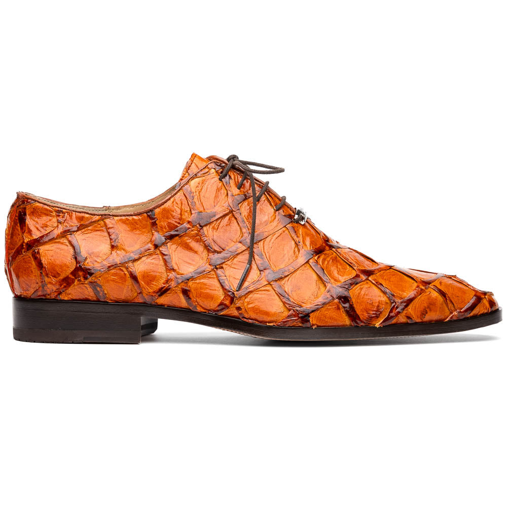 A pair of Olivieri Brandy by Marco Di Milano luxury dress oxford shoes in orange-brown crocodile leather with dark laces, one shoe shown on its side highlighting the branded sole.