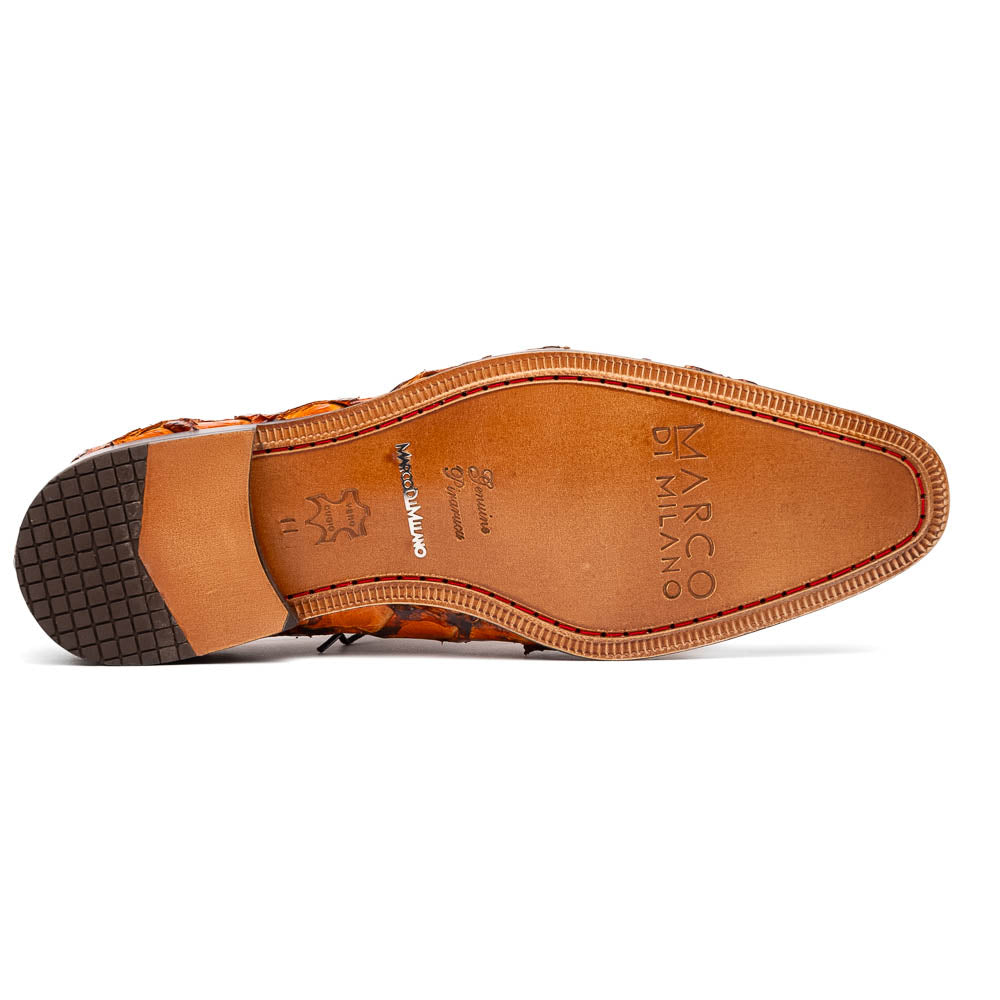 A pair of Olivieri Brandy by Marco Di Milano luxury dress oxford shoes in orange-brown crocodile leather with dark laces, one shoe shown on its side highlighting the branded sole.