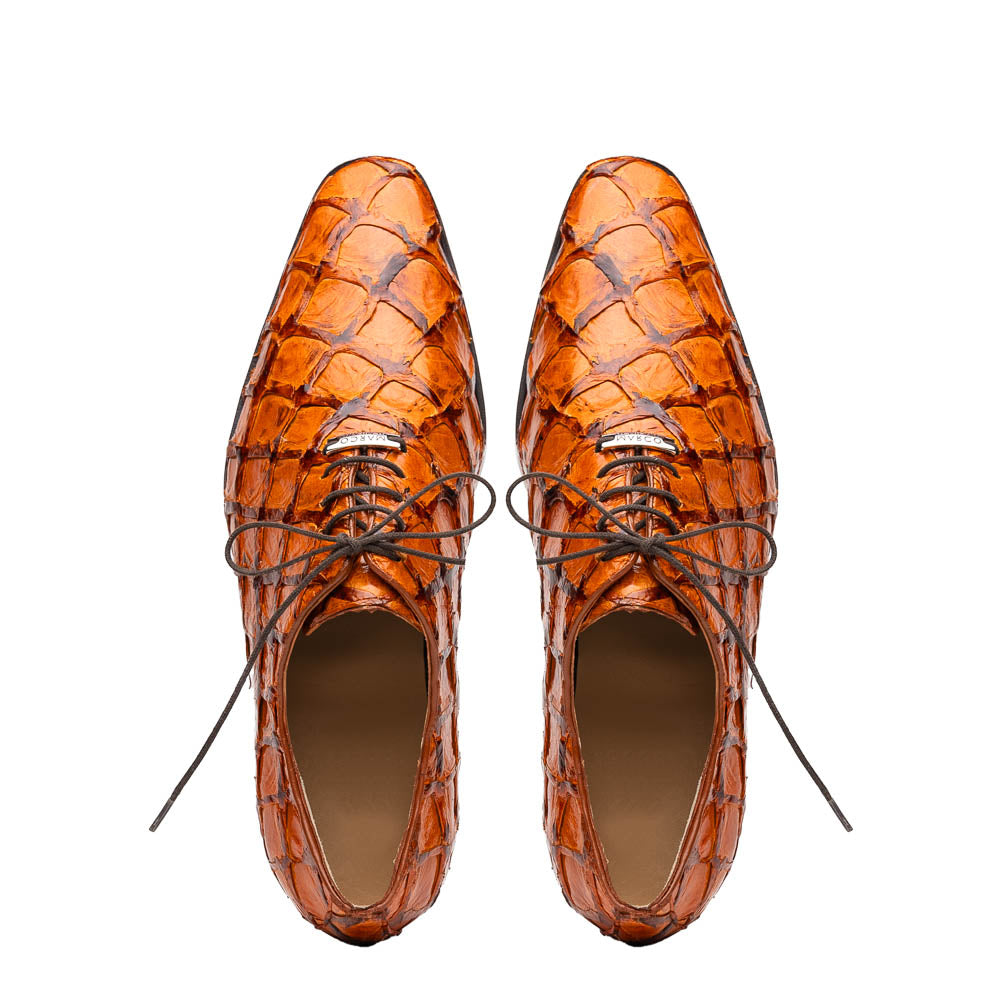 A pair of Olivieri Brandy by Marco Di Milano luxury dress oxford shoes in orange-brown crocodile leather with dark laces, one shoe shown on its side highlighting the branded sole.