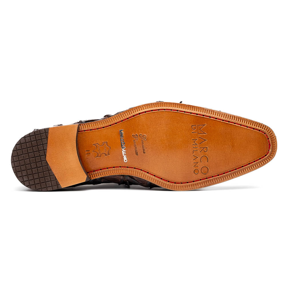 A pair of Olivieri Brown oxford shoes by Marco Di Milano—one upright, one on its side revealing the branded sole—showcase luxurious crocodile leather craftsmanship.