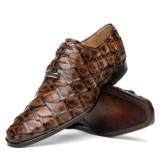 The Olivieri Clear Brown oxford shoes by Marco Di Milano showcase a textured crocodile leather design; one shoe stands upright as the other lies on its side, displaying the sole.