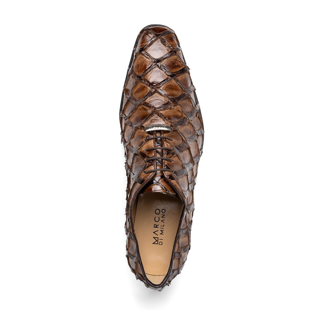 The Olivieri Clear Brown oxford shoes by Marco Di Milano showcase a textured crocodile leather design; one shoe stands upright as the other lies on its side, displaying the sole.