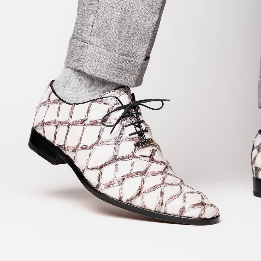 The Marco Di Milano Olivieri Newspaper is a luxury dress oxford featuring a white and gray pattern, black laces, red lining, and brown leather soles—crafted from genuine pirarucu for an elegant statement.