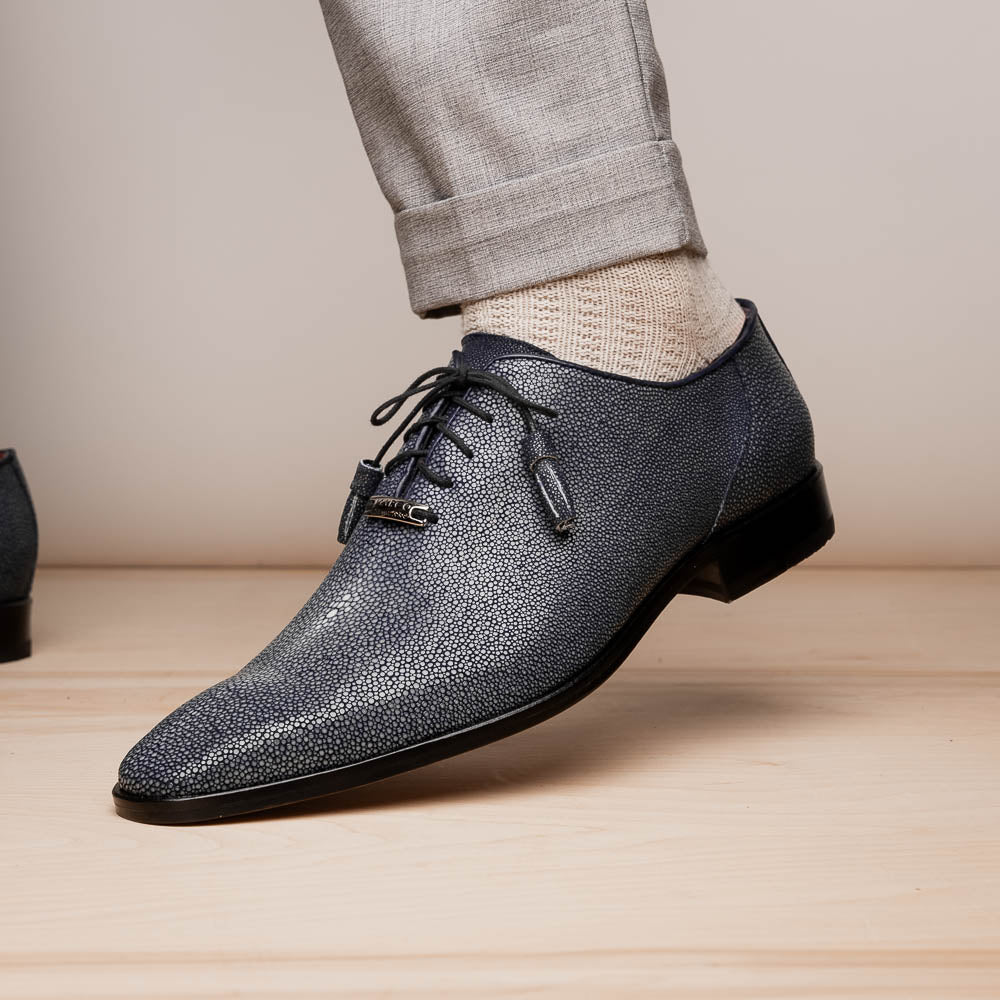 A pair of black textured Pannuci Black oxfords by Marco Di Milano, featuring red inner lining and a tan sole with the brand's logo—luxury footwear for those who value timeless style.
