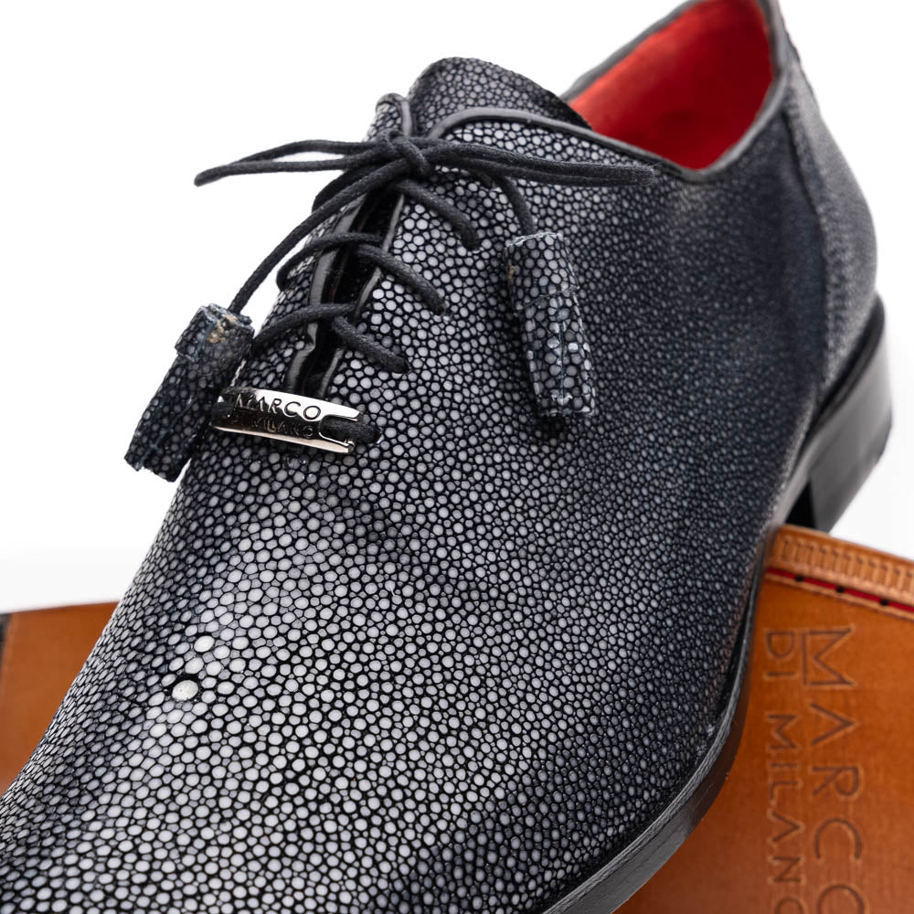 A pair of black textured Pannuci Black oxfords by Marco Di Milano, featuring red inner lining and a tan sole with the brand's logo—luxury footwear for those who value timeless style.