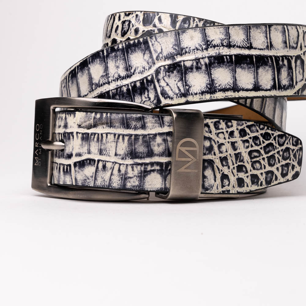 Here’s a rewritten sentence using your product data: The Silvio Belt Antique Newspaper by Marco Di Milano is a black and white genuine caiman belt with a crocodile pattern, finished with a silver buckle engraved with “Marco Di Milano.”.