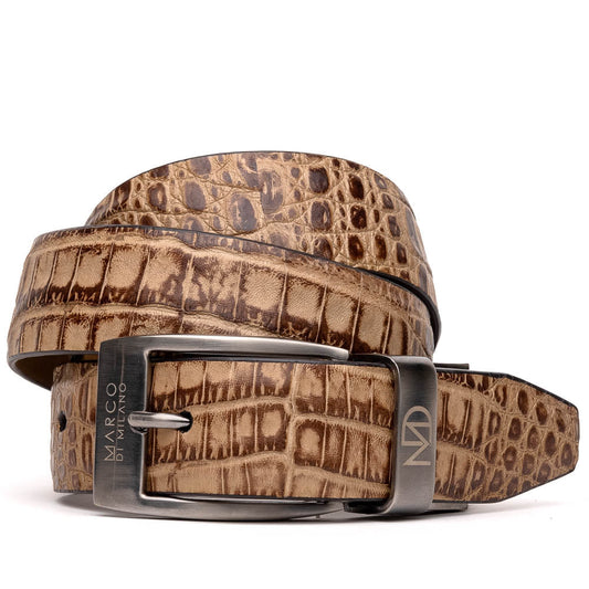 The Riccardo Belt Rustic Orix by Marco Di Milano features brown crocodile-patterned genuine caiman fuscus-belly leather and a metal buckle engraved with the brand's logo and "MD" initials.