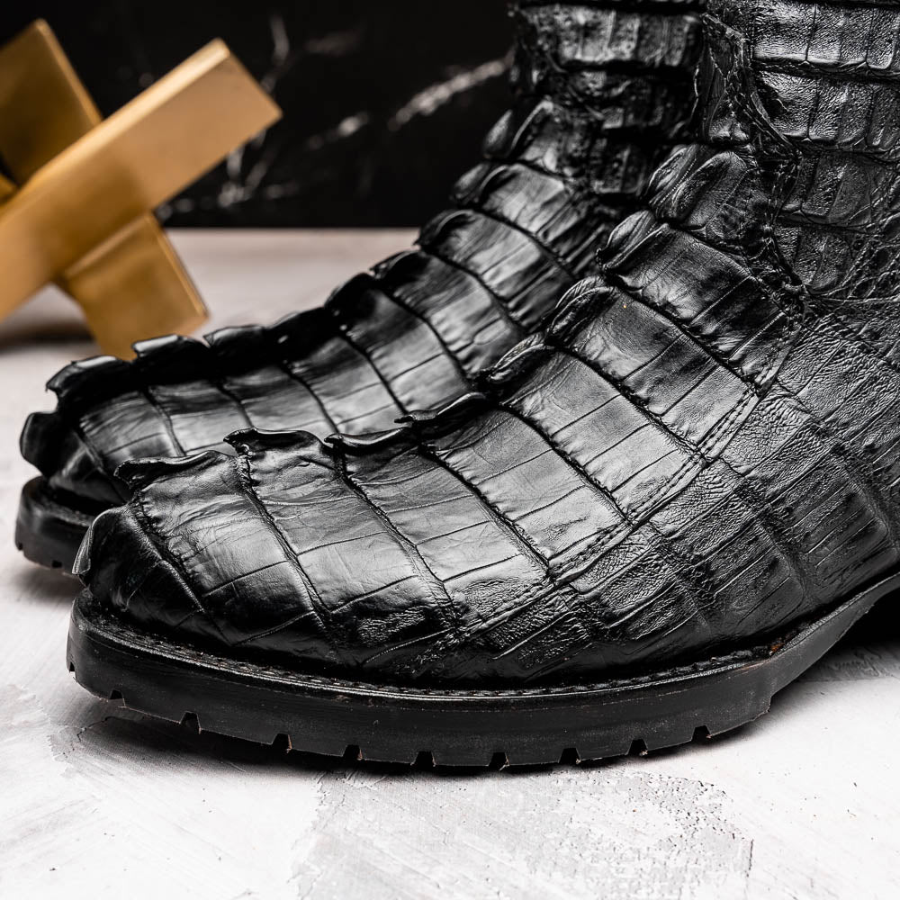 The Marlboro Black by Marco Di Milano: black hornback caiman cowboy boots with a crocodile skin pattern and low heels, shown on a white background.