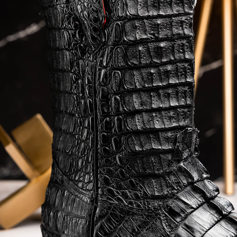 The Marlboro Black by Marco Di Milano: black hornback caiman cowboy boots with a crocodile skin pattern and low heels, shown on a white background.