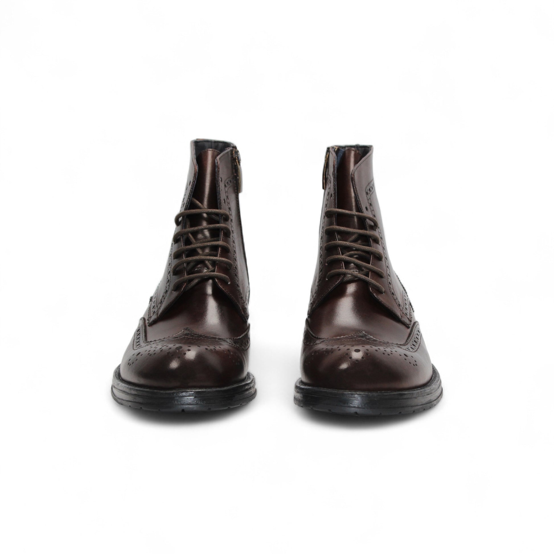 The Firmani Daniel Brown by Firmani is a brown genuine leather brogue boot with wingtip details and laces, displayed side view on a white background.