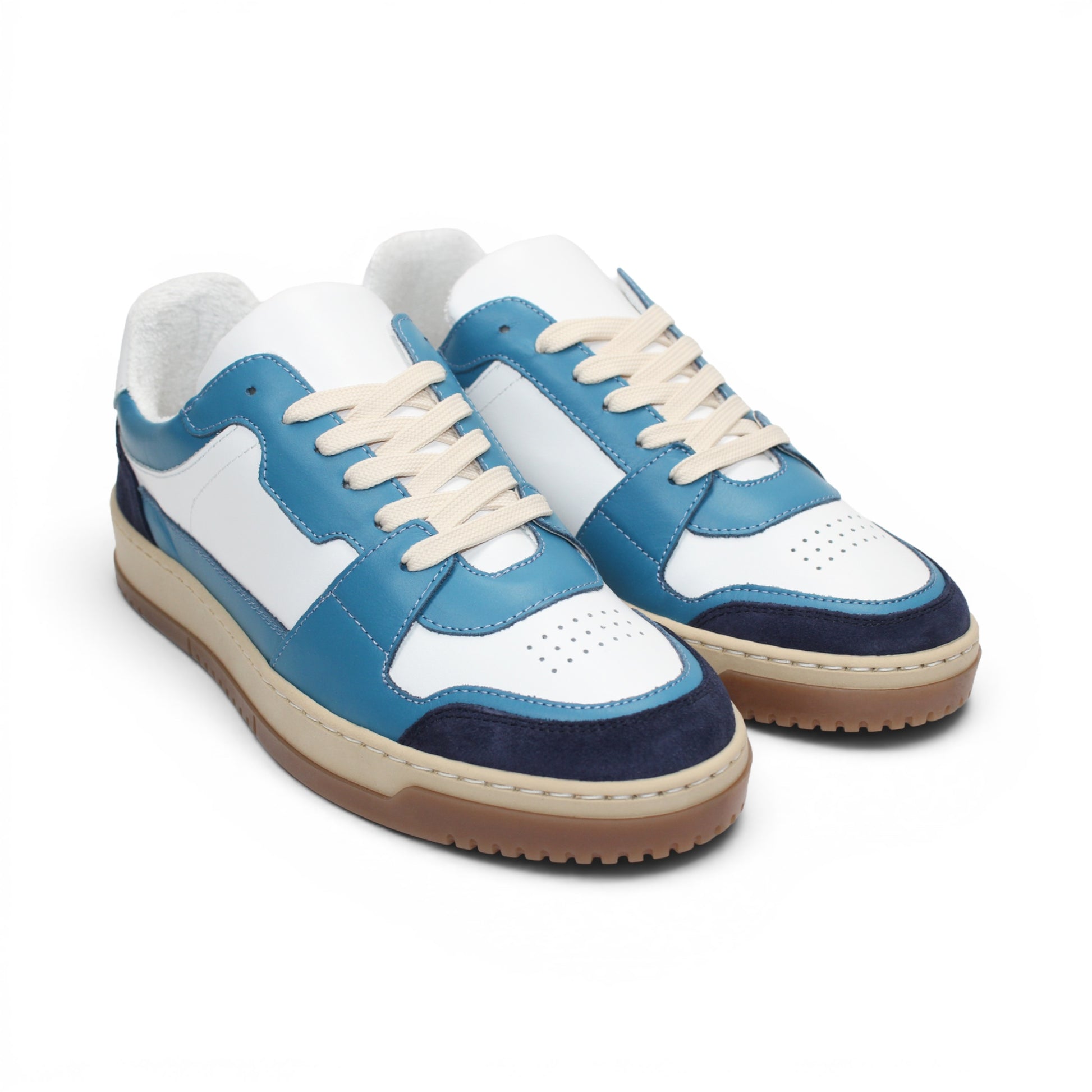 The Duca Di Matiste Duca DC80 Blue Combo is a luxury low-top casual shoe in blue, white, and beige with a gum sole, white laces, and a mix of calf leather and suede materials.
