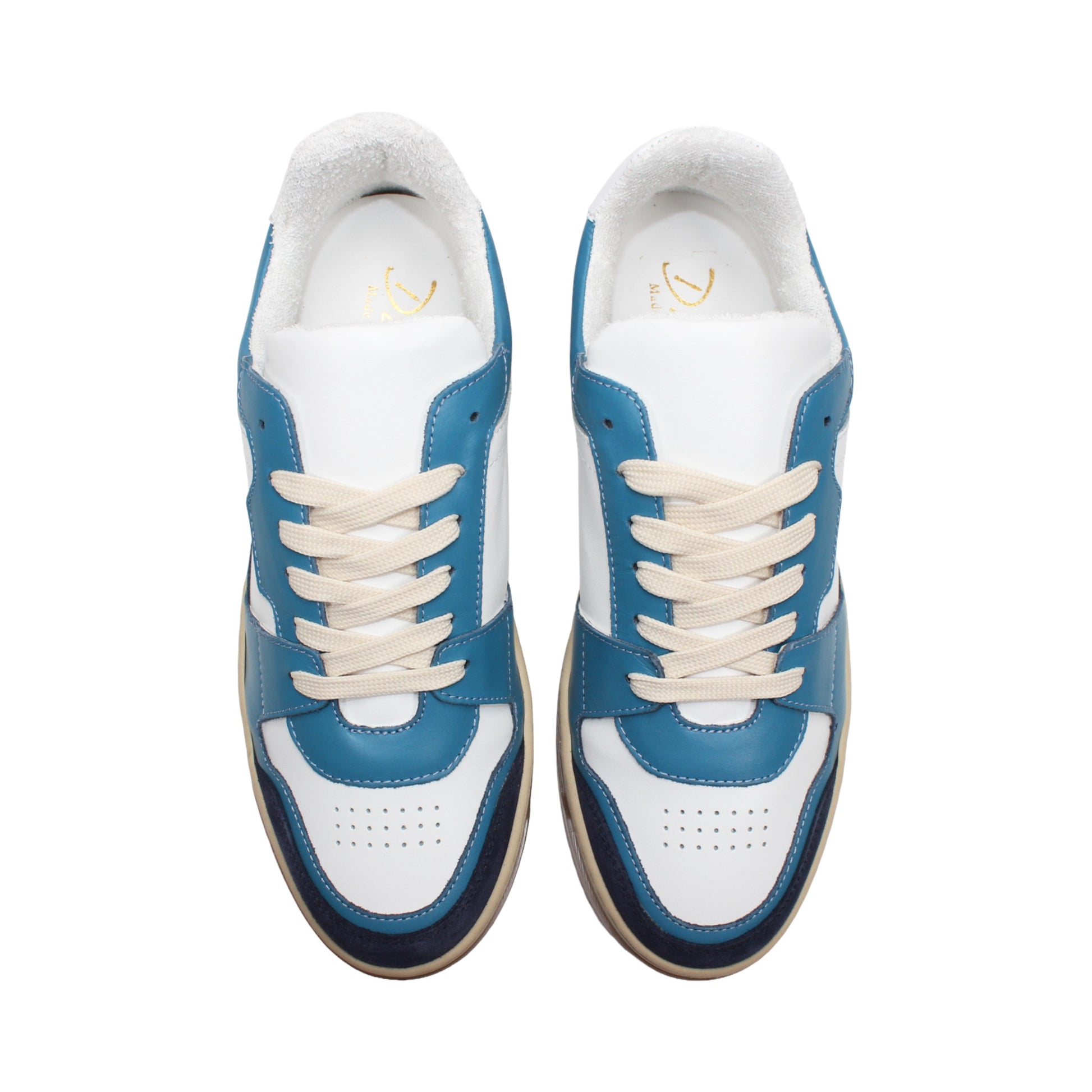 The Duca Di Matiste Duca DC80 Blue Combo is a luxury low-top casual shoe in blue, white, and beige with a gum sole, white laces, and a mix of calf leather and suede materials.