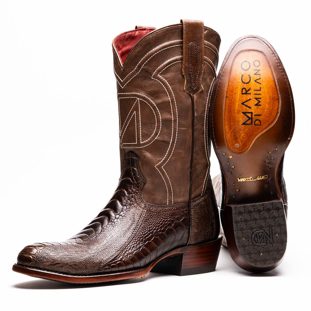 The Denver Clear Brown by Marco Di Milano are textured leather Western cowboy boots in brown, featuring white stitching and branded soles.