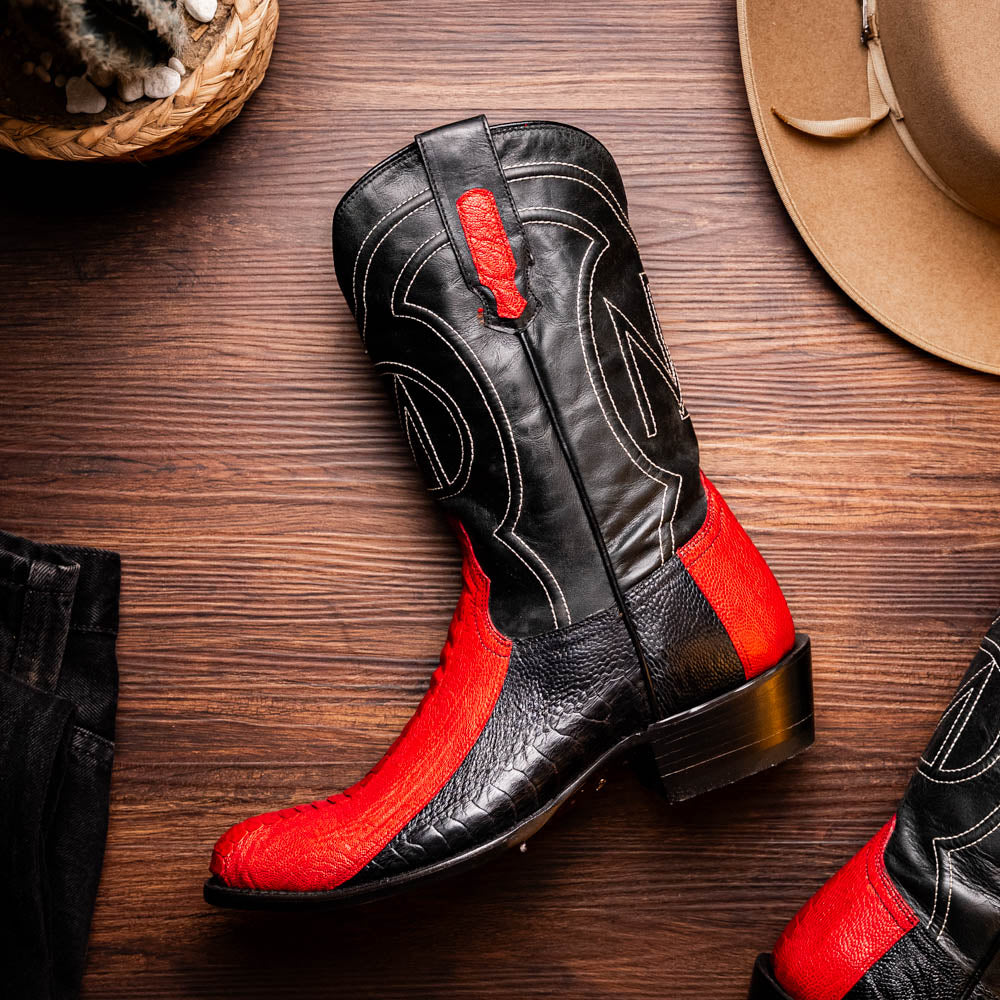 The Marco Di Milano Denver Red / Black boots feature red and black leather, a textured pattern, decorative stitching, and a branded sole—one boot stands upright while the other displays the sole.