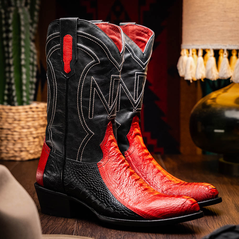 The Marco Di Milano Denver Red / Black boots feature red and black leather, a textured pattern, decorative stitching, and a branded sole—one boot stands upright while the other displays the sole.