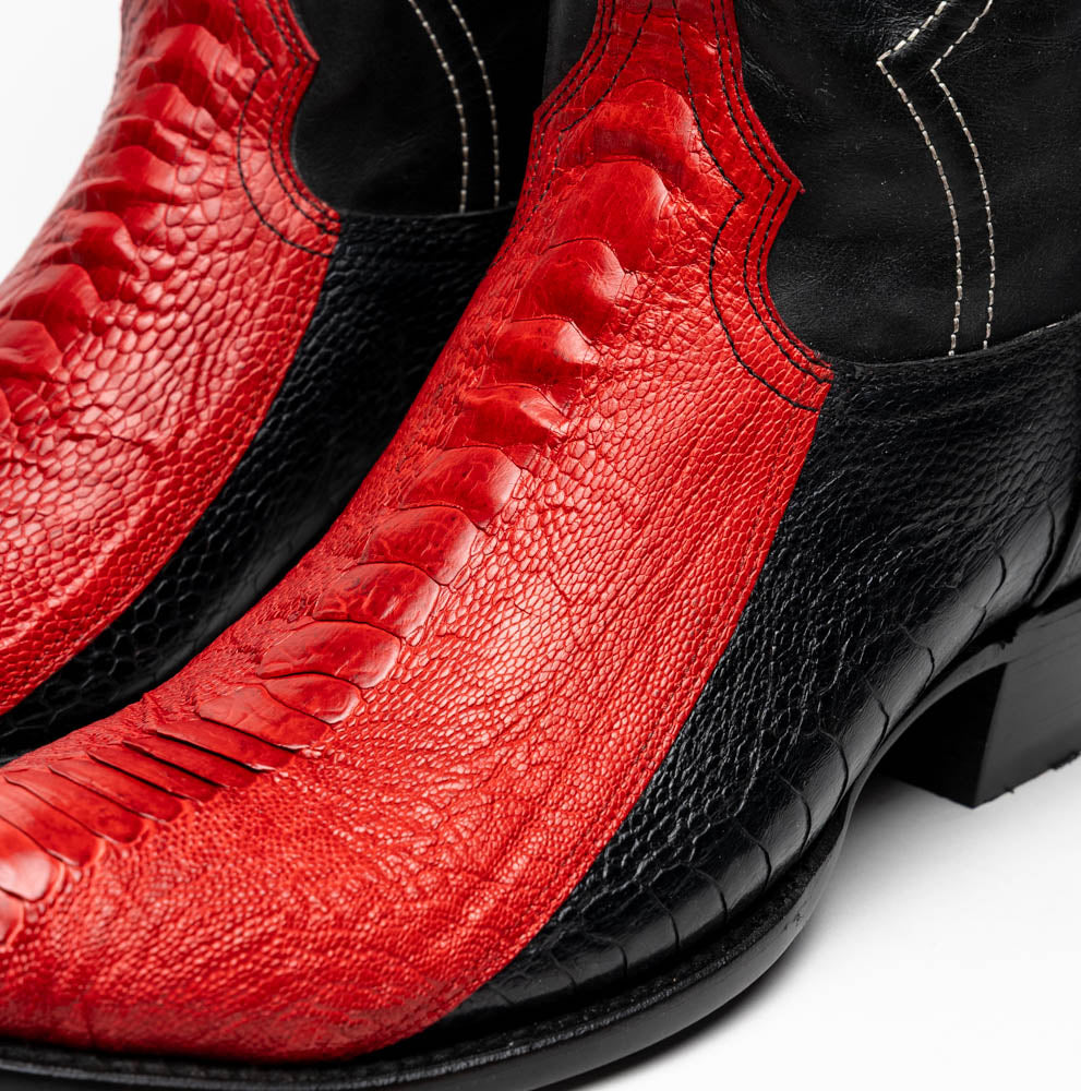 The Marco Di Milano Denver Red / Black boots feature red and black leather, a textured pattern, decorative stitching, and a branded sole—one boot stands upright while the other displays the sole.