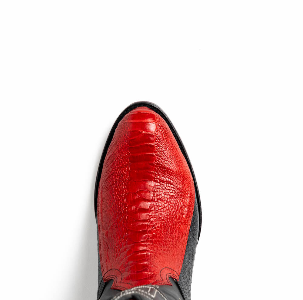 The Marco Di Milano Denver Red / Black boots feature red and black leather, a textured pattern, decorative stitching, and a branded sole—one boot stands upright while the other displays the sole.