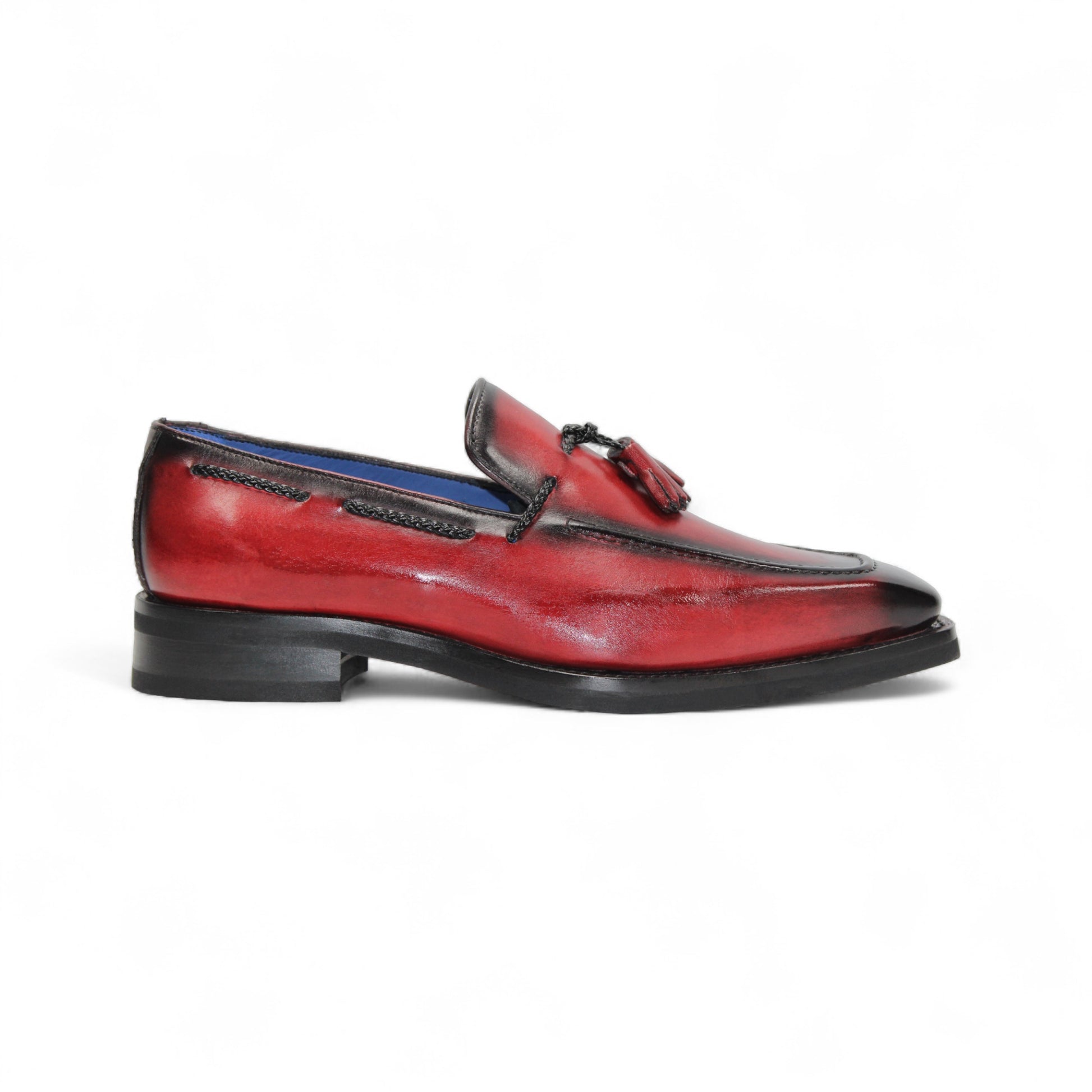 The Emilio Franco Dino Red/Black loafer features genuine red leather with black accents, tassel detail, a low black heel, handcrafted in Italy by Emilio Franco, and shown on a white background.