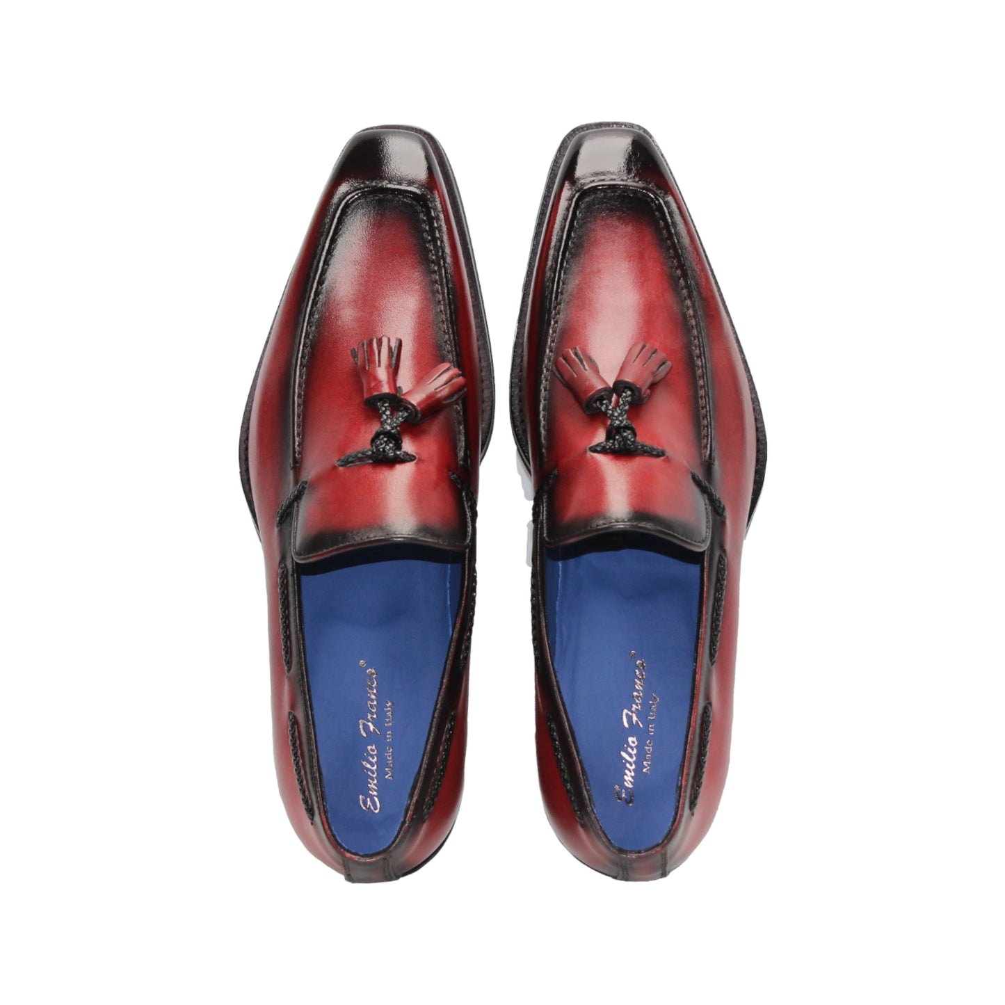 The Emilio Franco Dino Red/Black loafer features genuine red leather with black accents, tassel detail, a low black heel, handcrafted in Italy by Emilio Franco, and shown on a white background.