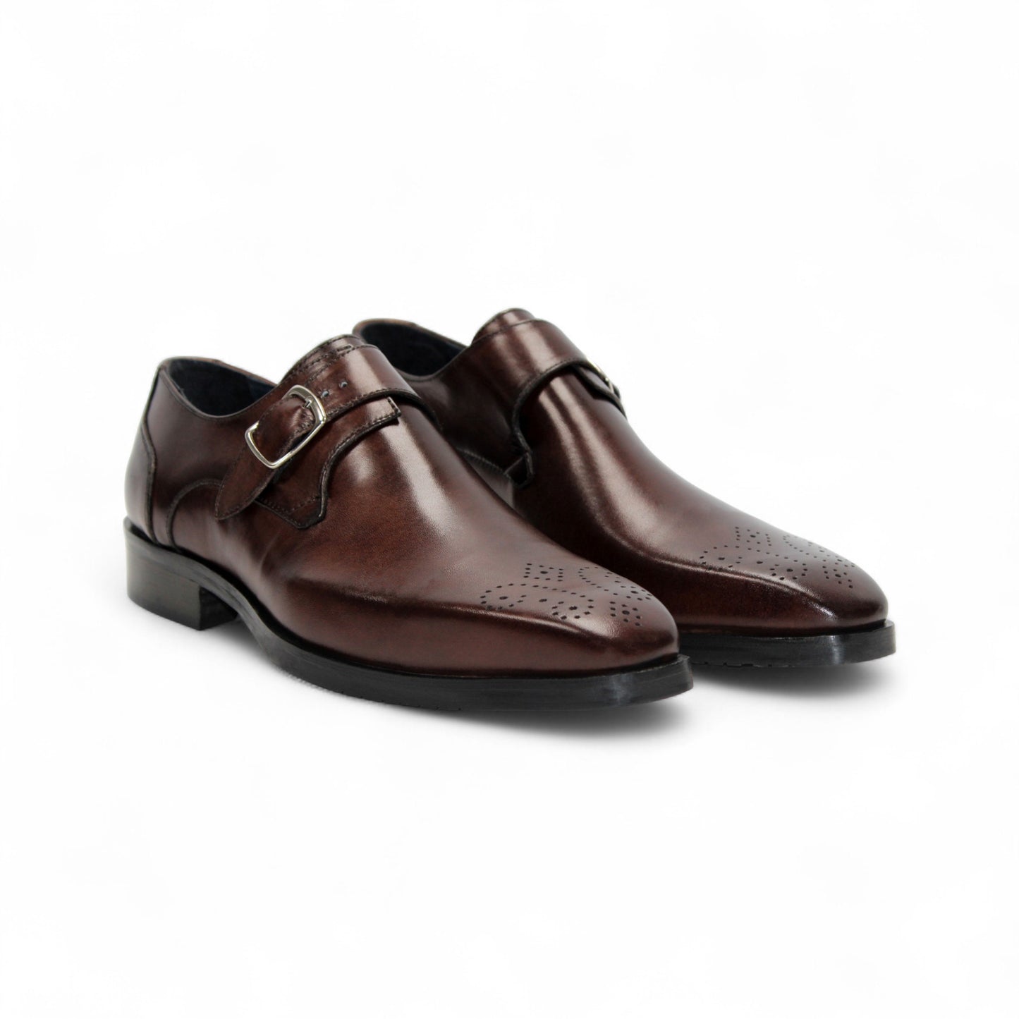 The Firmani Duncan Chocolate men's dress shoe features brown Italian leather, a silver buckle, and perforated detailing, displayed in side profile on a white background.